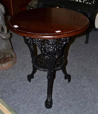 Lot 1104 - Painted cast iron pub table