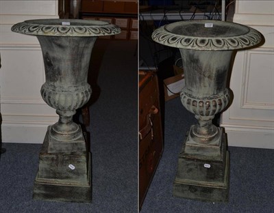 Lot 1109 - Pair of reproduction patinated metal garden urns