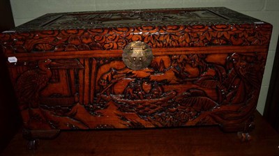 Lot 1129 - A 20th century carved camphor wood box