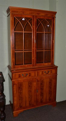 Lot 1131 - Reproduction glazed bookcase cabinet