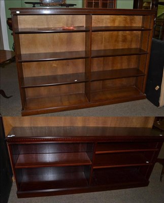 Lot 1136 - An oak four height open bookcase with adjustable shelves; together with a low open bookcase (2)