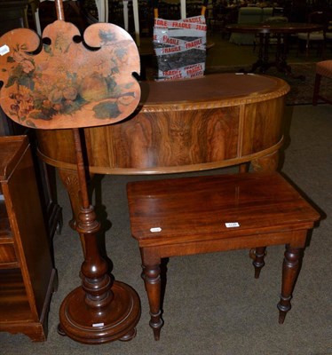 Lot 1138 - A 19th century mahogany pole screen together with a low table of similar date (2)