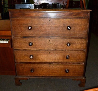 Lot 1142 - An oak secretaire chest