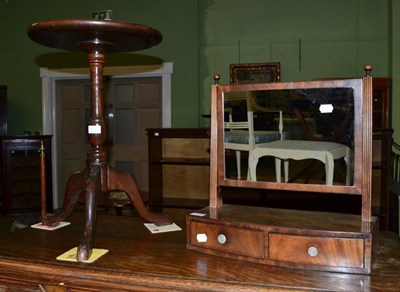 Lot 1144 - A 19th century mahogany toilet mirror; and an oak tripod table