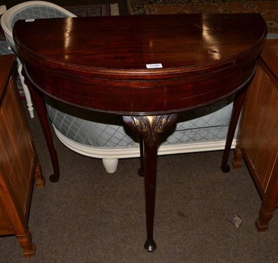 Lot 1149 - A mahogany D-shaped fold over card table