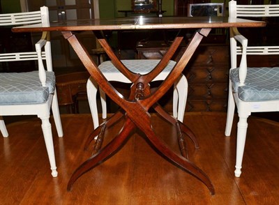 Lot 1152 - A mahogany coaching table with stencilled maker's mark and stamped number 1106