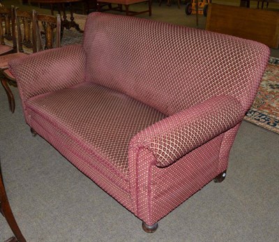 Lot 1160 - Late Victorian mahogany framed drop-end sofa in red velvet upholstery