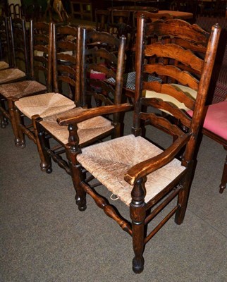 Lot 1163 - Eight oak ladder back chairs