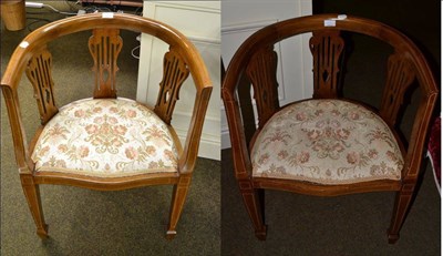 Lot 1172 - A pair of Edwardian inlaid mahogany tub chairs (2)