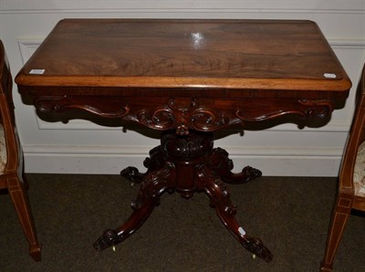 Lot 1173 - A Victorian rosewood card table