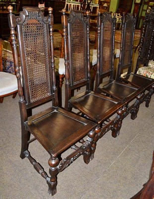 Lot 1181 - Set of four oak cane backed dining chairs