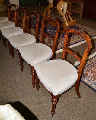 Lot 1183 - A set of six Victorian carved mahogany balloon back dining chairs (6)