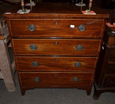 Lot 1192 - A Regency mahogany chest of drawers, the cross banded top with boxwood stringing