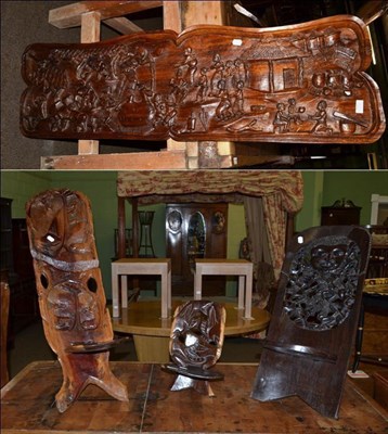 Lot 1193 - Three carved African chairs and one African panel