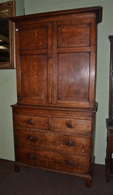 Lot 1214 - George III oak linen press