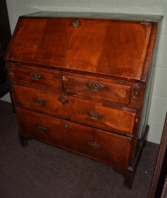 Lot 1219 - An 18th century walnut bureau