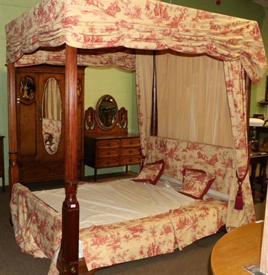 Lot 1226 - A 19th century style four poster bed by Stanley of Brompton