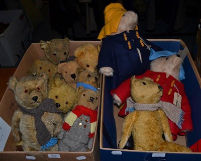 Lot 1231 - Two modern Paddington Bears in duffel coats, hats and wellies; and assorted jointed yellow...