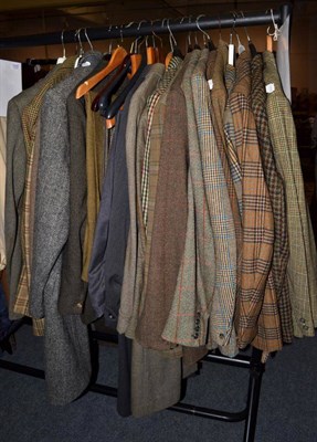 Lot 1243 - A quantity of assorted gents mainly green wool, checked or tweed jackets, wool trousers and...