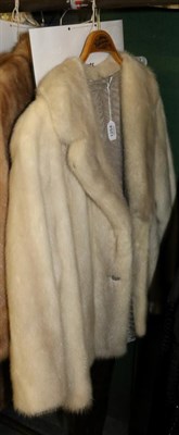 Lot 1254 - A white mink jacket with decorative paste set buttons