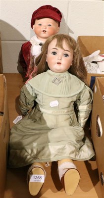 Lot 1265 - Bisque socket head character toddler doll wearing striped trousers, 55cm; German 171 bisque...