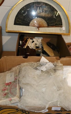 Lot 1279 - Assorted white linen cloths, napkins, placemats, lace, red cross folding stand, small box of sewing