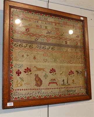 Lot 1284 - A large oak framed sampler worked by Elizabeth Christosen?, dated 1869