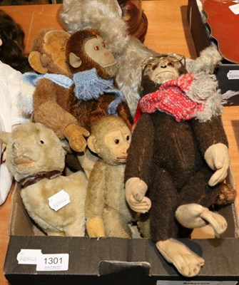 Lot 1301 - Assortment of soft toys, including a Merrythought jointed monkey, three others similar,...