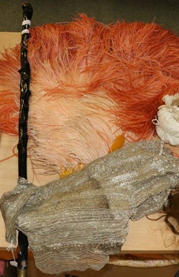 Lot 1321 - Circa 1920s large peach ostrich feather fan with yellow resin sticks and guards, a woven...