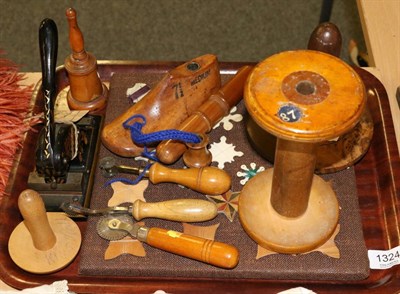 Lot 1324 - Assorted mainly treen sewing accessories including a bodkin holder, darning tool, bobbin,...