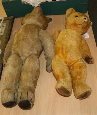 Lot 1326 - Circa 1920s/30s yellow plush jointed teddy bear with stitched nose, glass eyes, stitched claws...