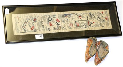 Lot 1348 - Chinese embroidered silk sleeve band, framed; pair of Chinese silk shoes (2)