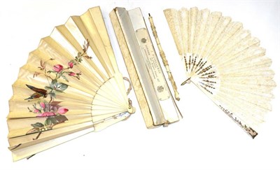 Lot 1355 - Early 20th century bone fan, with floral painted decoration (a.f.), in a card Duvelleroy fan...