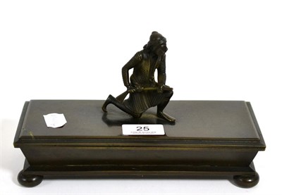 Lot 25 - A bronze desk standish of caddy form, the cover surmounted by an Indian soldier
