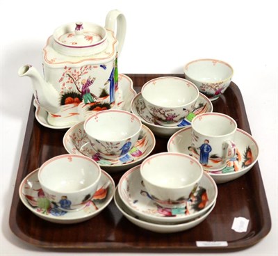 Lot 30 - A group of Newhall tea wares including a teapot, teapot stand, tea bowls, saucers etc