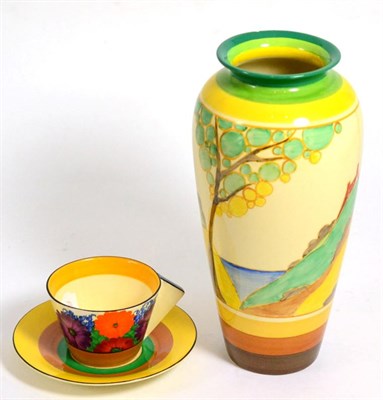 Lot 48 - A Clarice Cliff Bizarre cup and saucer and a Clarice Cliff Bizarre ware vase