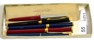 Lot 55 - An S.T. Dupont Laque de Chine fountain pen with 18ct gold nib, cased; together with three...