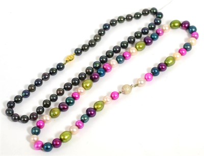 Lot 63 - A Tahitian cultured pearl necklace, clasp stamped '375', length 44cm and a multi-coloured...