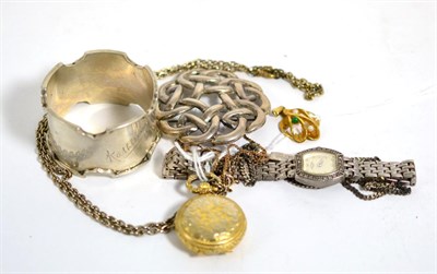 Lot 69 - A silver napkin ring, a 9 carat gold pendant, a silver Rotary wristwatch, Celtic brooch etc
