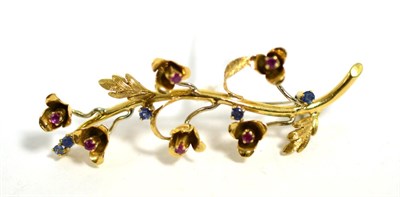 Lot 77 - An 18 carat gold ruby and sapphire spray brooch, length 6.5cm