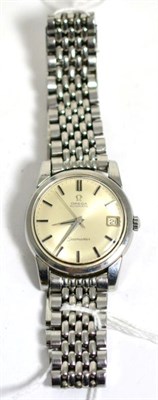 Lot 79 - A stainless steel automatic calendar centre seconds wristwatch, signed Omega, model: Seamaster,...