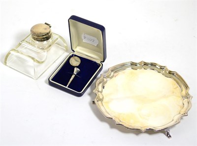 Lot 114 - A silver waiter; a silver topped desk standish; and a silver golf tea and putting marker (boxed)