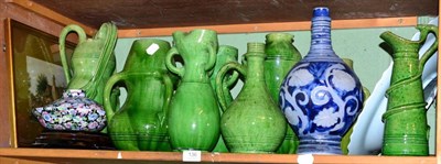 Lot 136 - A shelf of green glazed earthenware, etc