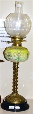 Lot 145 - A Victorian brass oil lamp with yellow glass font