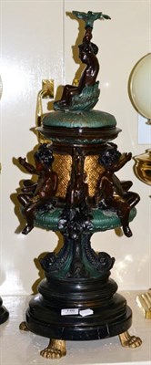 Lot 146 - A cast and painted metal centrepiece on marble base