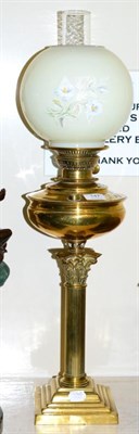 Lot 147 - A brass Corinthian column oil lamp with shade, copper kettle and a brass jam pan