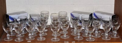 Lot 168 - A suite of thirty cut glass goblets, together with a set of seven Dartington crystal tumblers