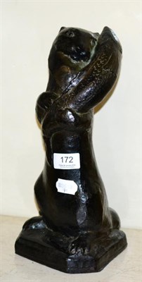 Lot 172 - A cast bronze model of an otter and fish