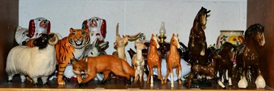 Lot 178 - A collection of ceramics including Beswick pottery tiger, palomino and brown horses, collie,...