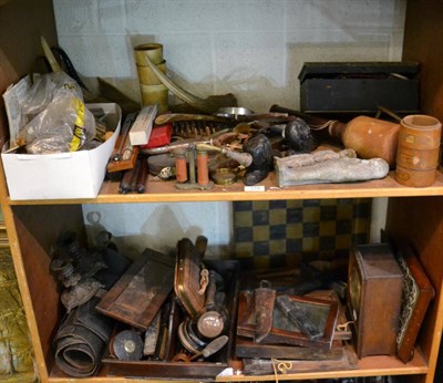 Lot 179 - Two shelves of collectables including a clock, antlers, trivets, etc